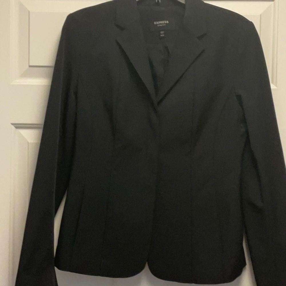 Black button down blazer from Express with design stitching on back. Size 9/10.